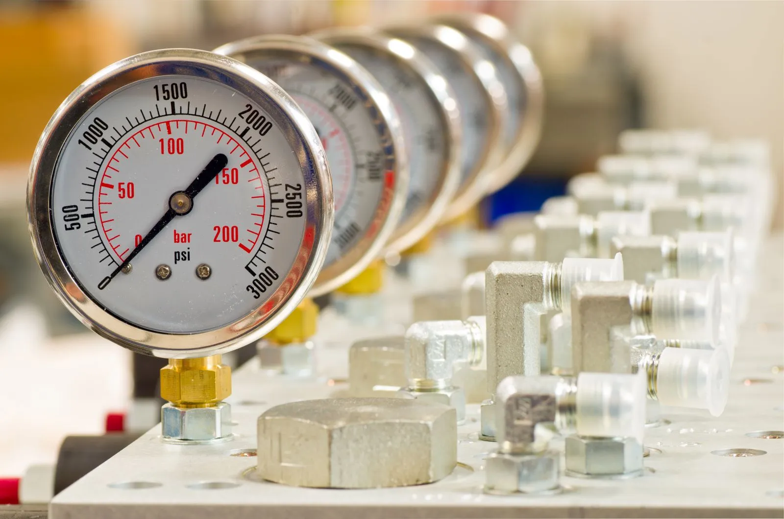 Pressure gauges and fittings awaiting calibration at the Dammam laboratory